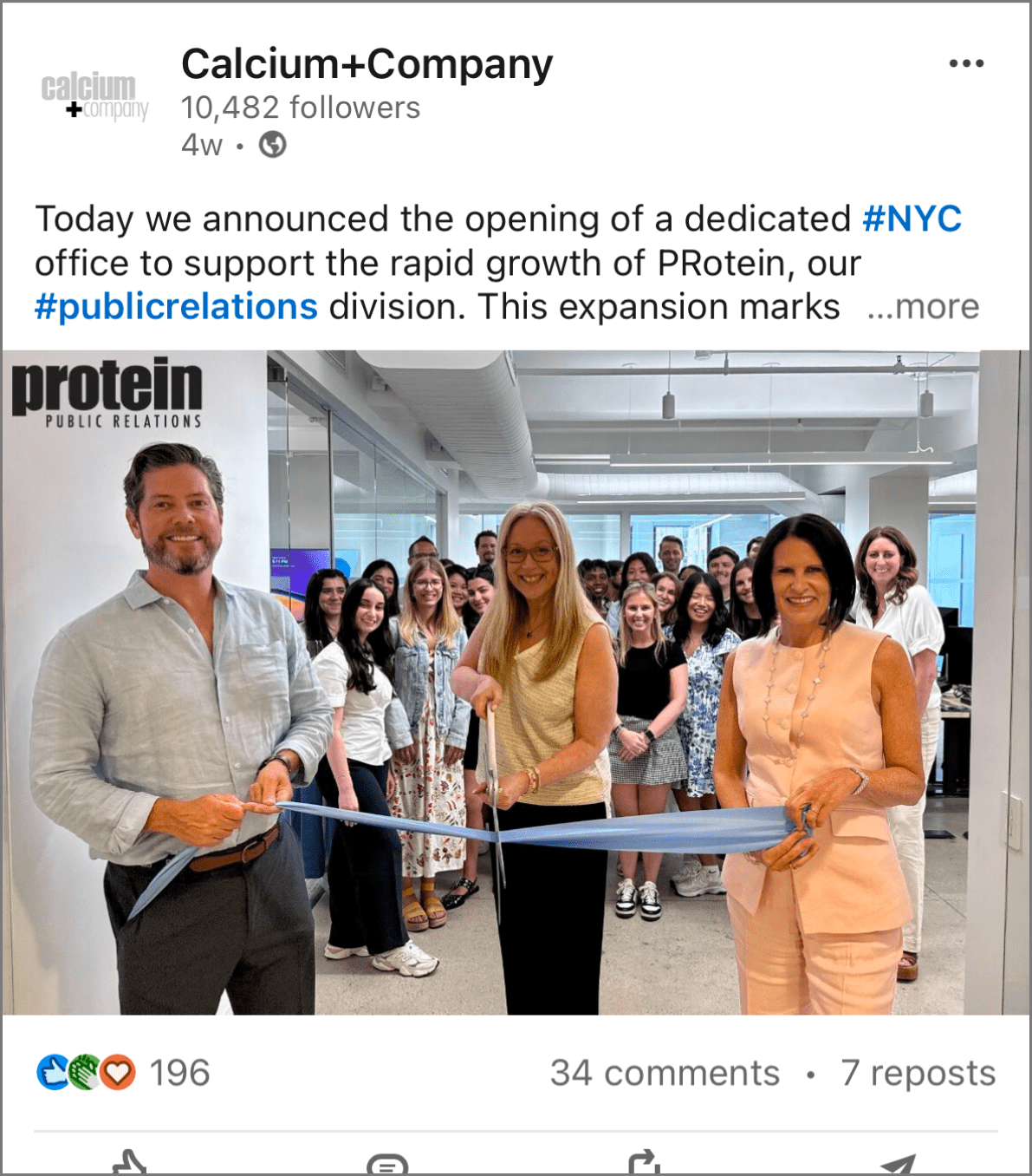 Judy Capano and Greg Lewis cut the ribbon to the new Flatiron office LinkedIn post
